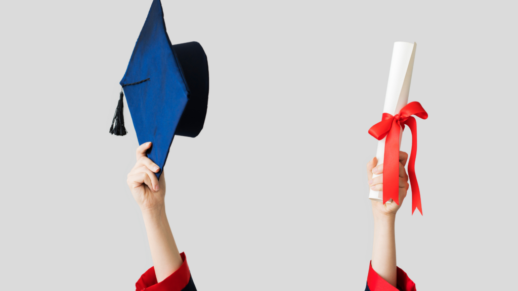 Graduation cap and scroll being held aloft